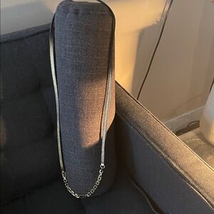 Gold leather & gold chain (not sure on what metal)